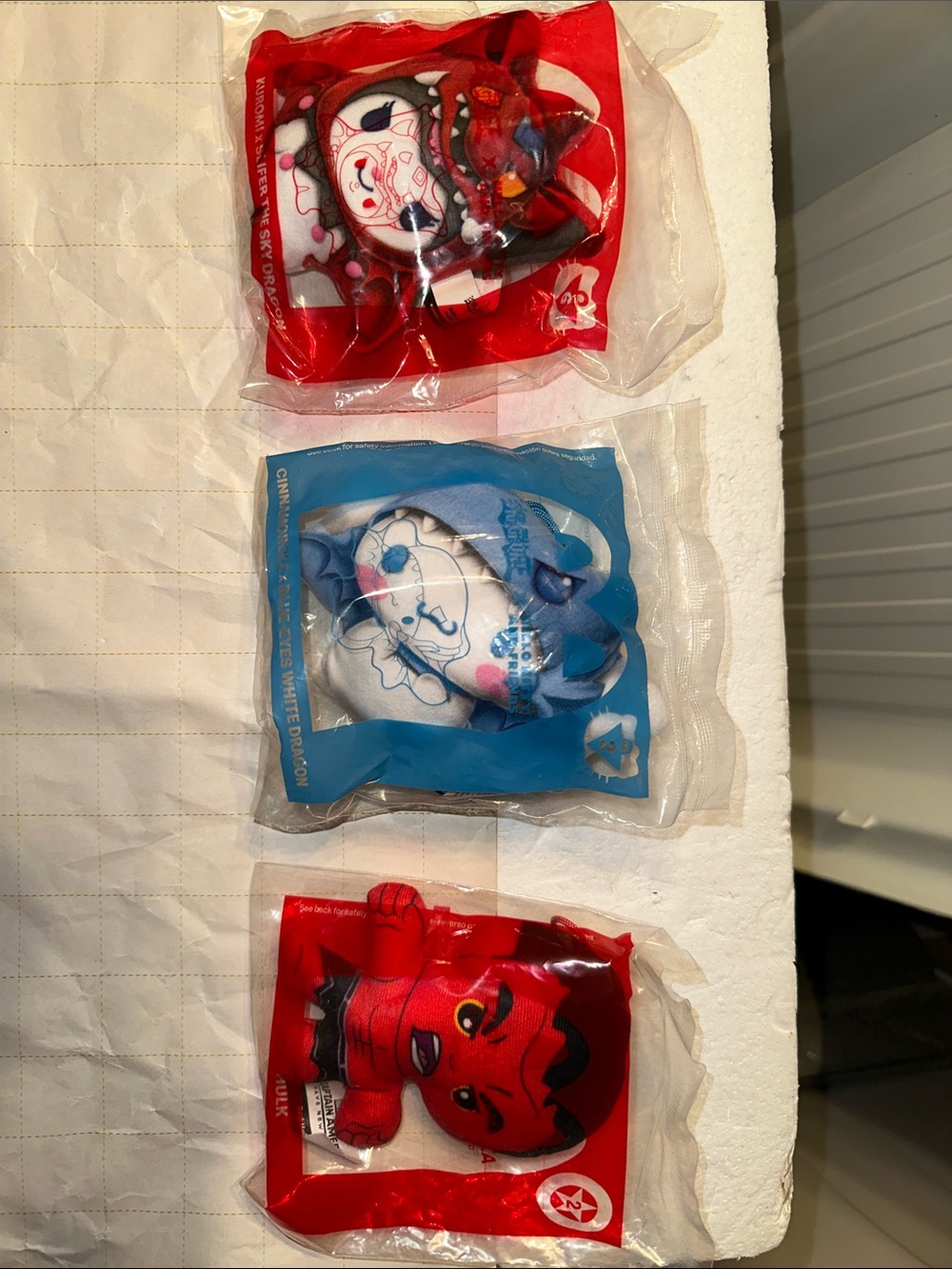 Three various Happy Meal toys